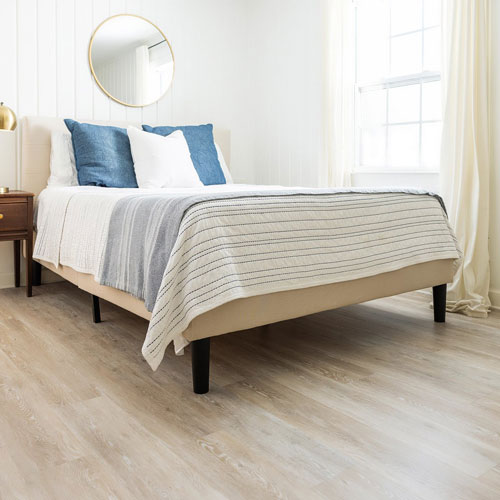 neutral hardwood flooring in bedroom 