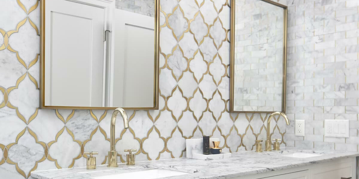 natural stone backsplash with gold metallic elements